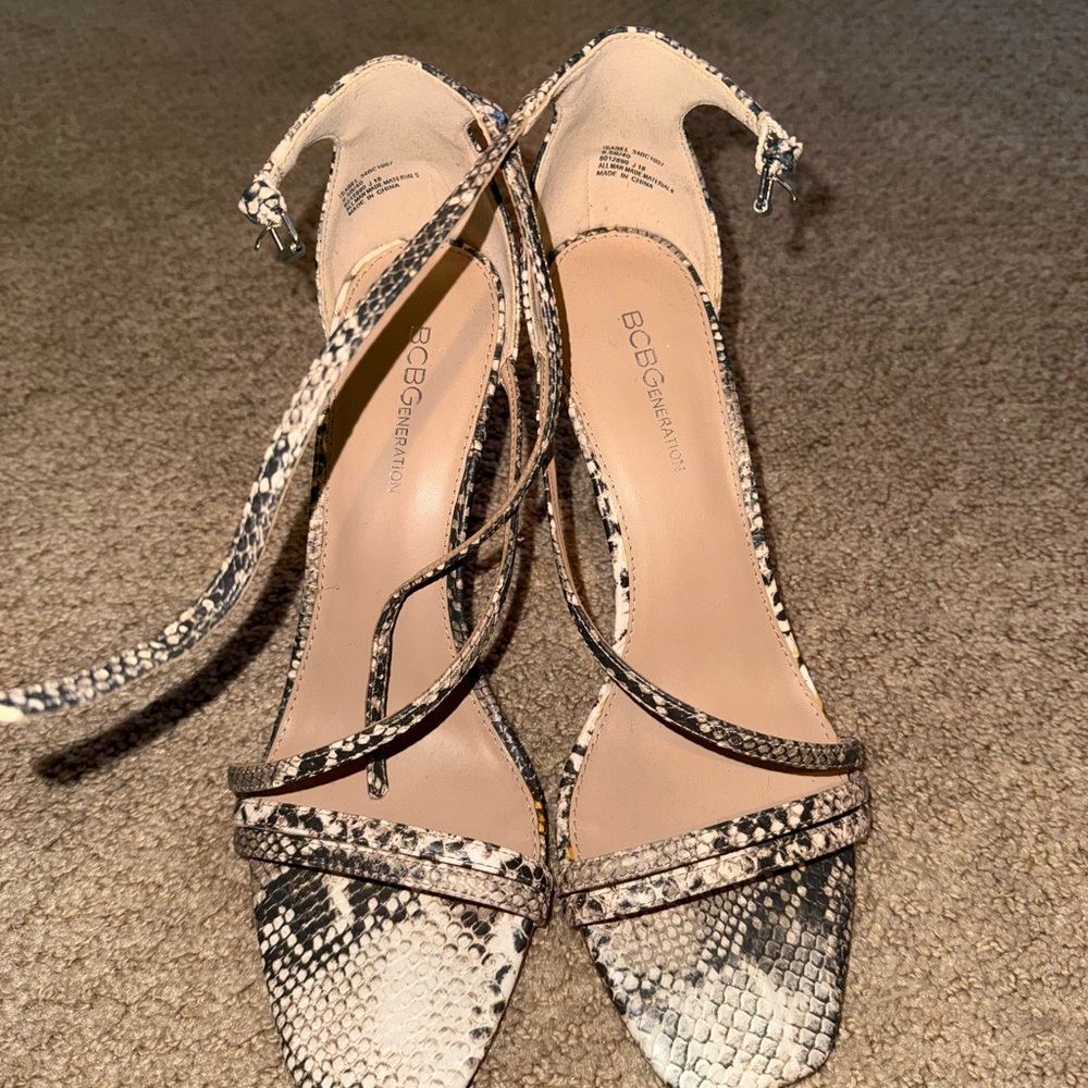 BCBGeneration Black and Cream Snakeskin Heels